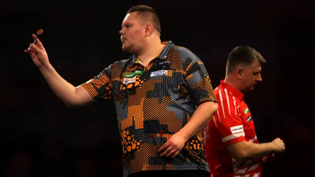 Wesley Plaisier throws a dart