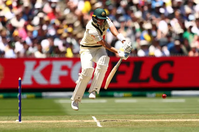 Jhye Richardson of Australia plays a shot