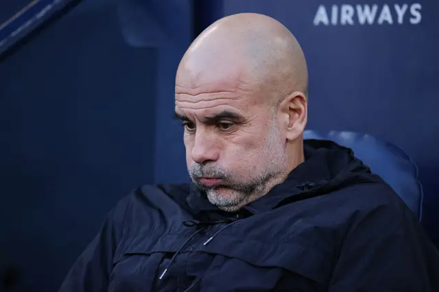 Pep Guardiola puffing his cheeks