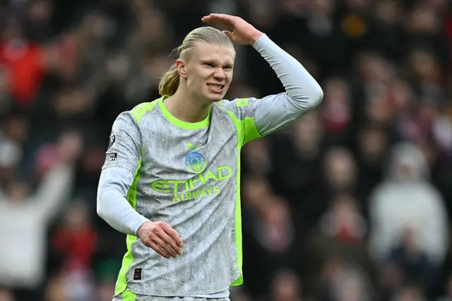 Manchester City's Norwegian striker #09 Erling Haaland reacts after missing a chance