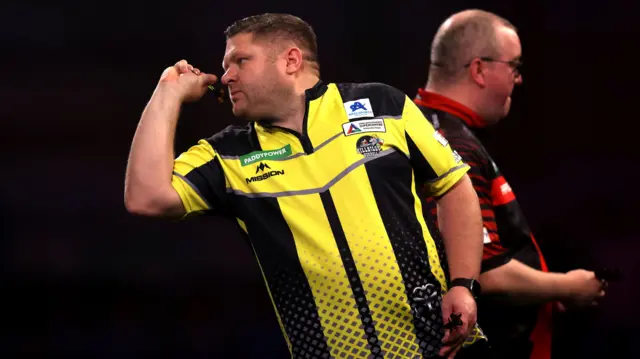 James Hurrell throws a dart
