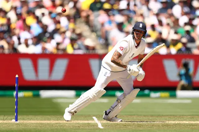 Brydon Carse of England plays a shot