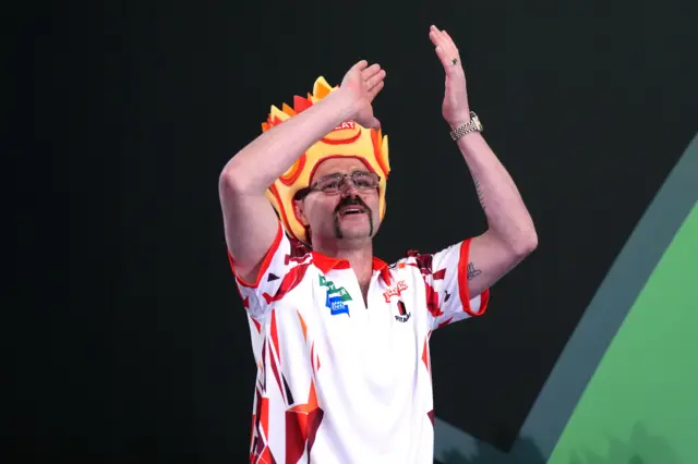 Australia's Damon Heta ahead of his match against England's Rob Cross on day fifteen of the Paddy Power World Darts Championship at the Alexandra Palace, London