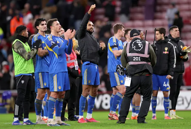 Leeds players waving to their fans