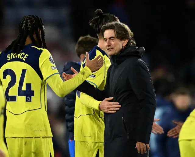 Frank high fives his players at full time