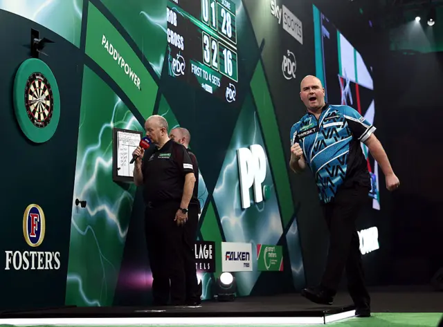 Rob Cross celebrates