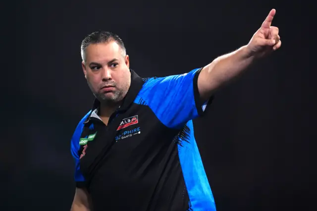 Jermaine Wattimena celebrates hitting a 180