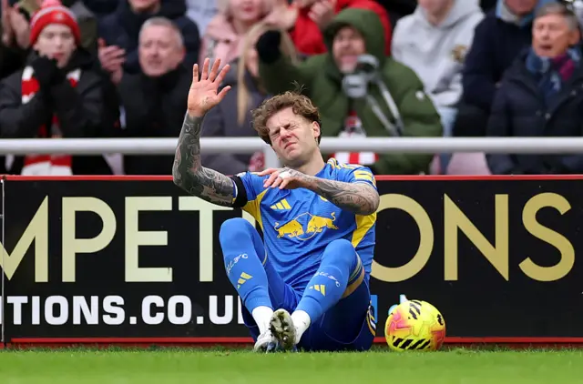 Joe Rodon of Leeds United goes down injured during the Premier League match between Sunderland and Leeds United at Stadium of Light on December 28, 2025 in Sunderland, England.
