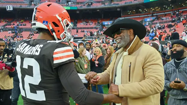 Cleveland Browns quarterback Shedeur Sanders with his father Deion Sanders before he plays the Pittsburgh Steelers
