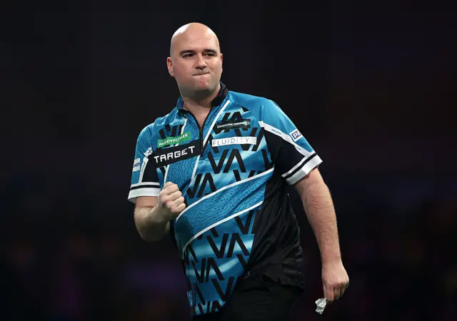 Rob Cross celebrates