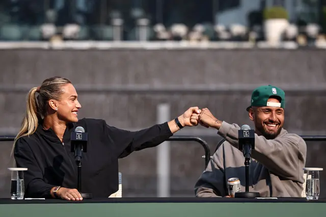 Belarus' Aryna Sabalenka (L) and Australia's Nick Kyrgios react during a press conference