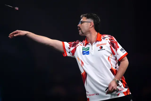 Australia's Damon Heta during his match against England's Rob Cross on day fifteen of the Paddy Power World Darts Championship at the Alexandra Palace, London