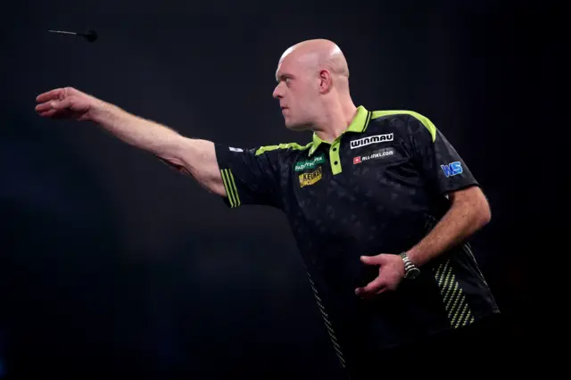 Netherlands' Michael van Gerwen during his match against Germany's Arno Merk on day fifteen of the Paddy Power World Darts Championship at the Alexandra Palace, London