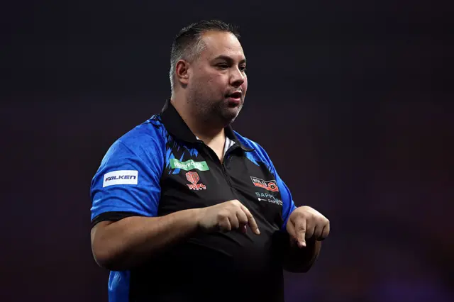 Jermaine Wattimena celebrates winning a set