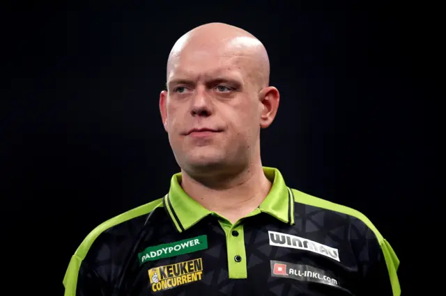 Netherlands' Michael van Gerwen during his match against Germany's Arno Merk on day fifteen of the Paddy Power World Darts Championship at the Alexandra Palace, London