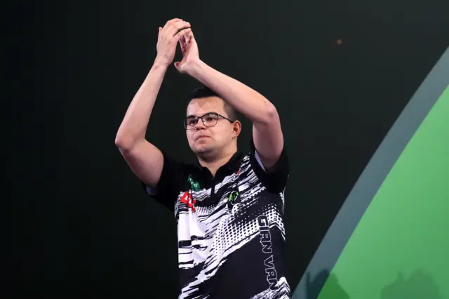 Gian van Veen applauds the Ally Pally crowd