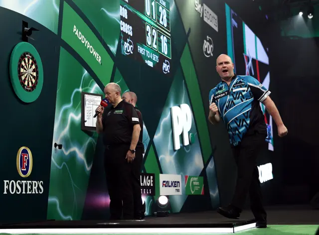 Former winner Rob Cross