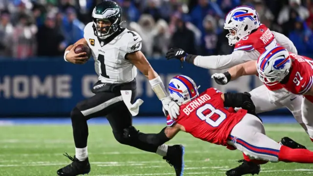 Jalen Hurts runs away from the Buffalo Bills defence
