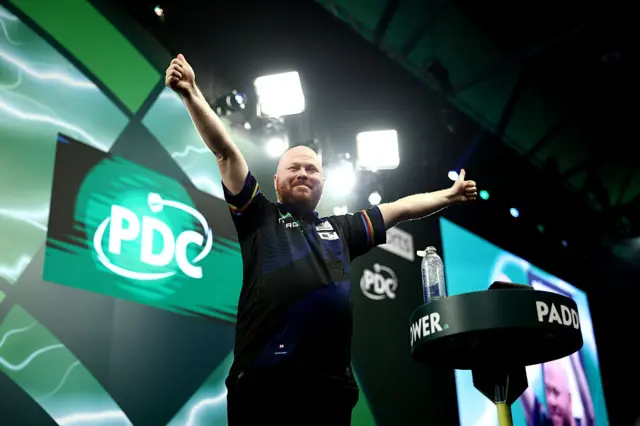 Justin Hood celebrates beating Charlie Manby