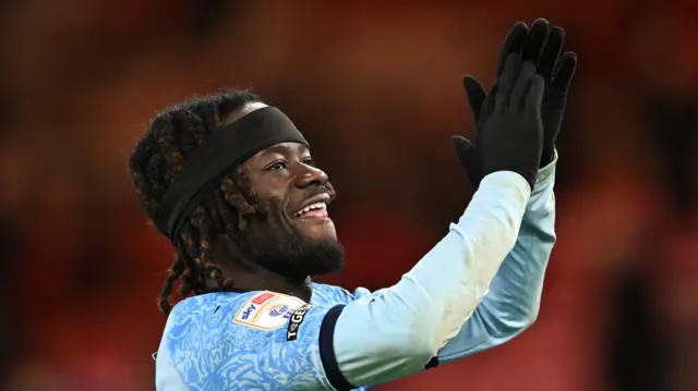 Goalscorer Darko Gyabi claps the Hull supporters at the end of their 1-0 win at Middlesbrough