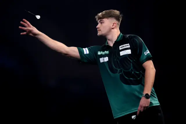England's Charlie Manby during his match against England's Ricky Evans on day sixteen of the Paddy Power World Darts Championship at the Alexandra Palace, London
