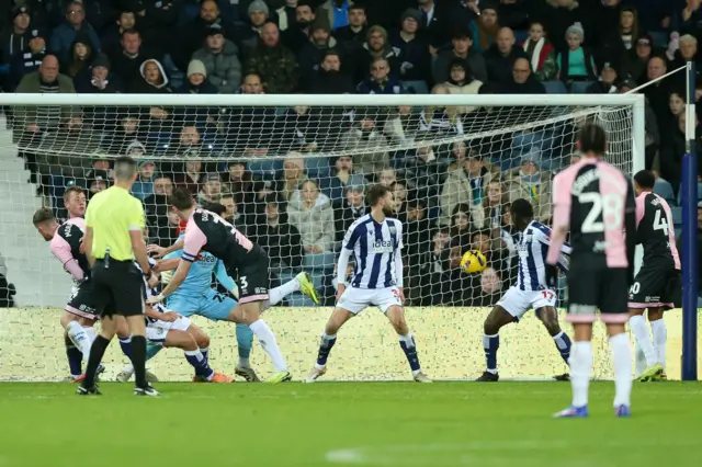West Bromwich Albion's Ousmane Diakite (centre right) scores an own goal for Queens Park Rangers