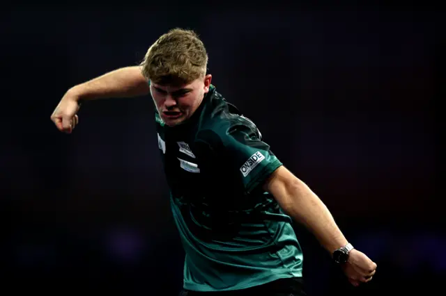 Charlie Manby celebrates winning the fourth set