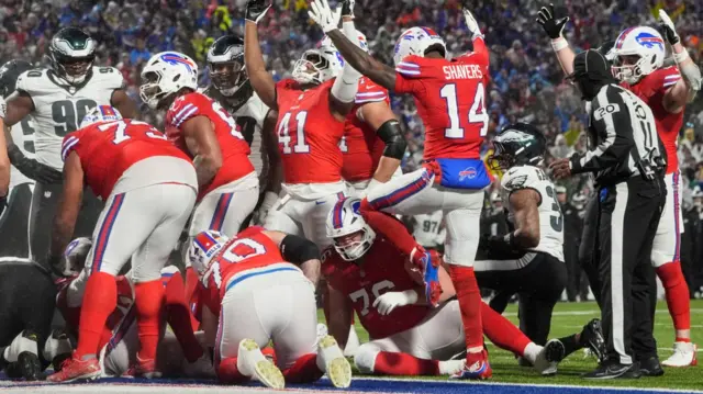 Buffalo Bills players celebrate a touchdown by Josh Allen against the Philadelphia Eagles