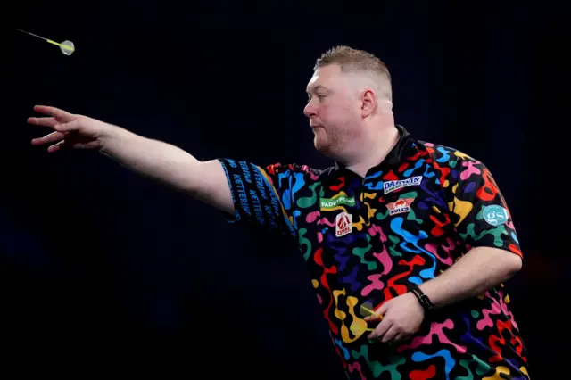 England's Ricky Evans during his match against England's Charlie Manby on day sixteen of the Paddy Power World Darts Championship at the Alexandra Palace, London