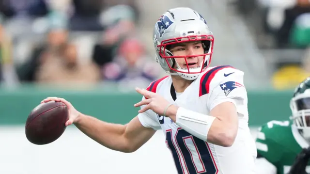 New England Patriots quarterback Drake Maye prepares to make a pass against the New York Jets