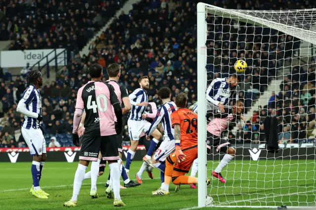 West Bromwich Albion's George Campbell (right) scores