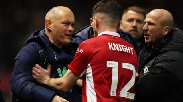 Millwall boss Alex Neil argues with Bristol City captain Jason Knight