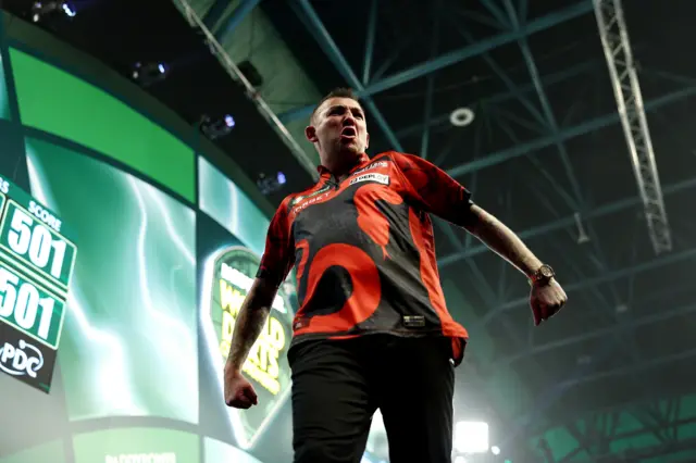 Nathan Aspinall celebrates a 170 checkout