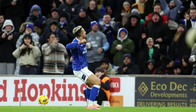 Callum Robinson celebrates