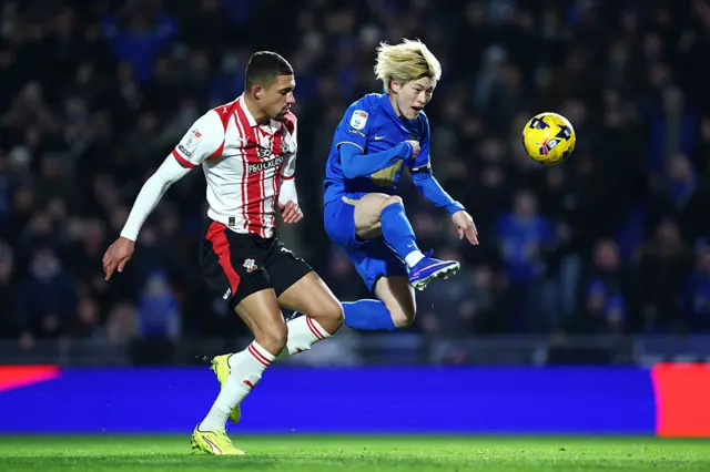 Kyogo Furuhashi of Birmingham City shoots whilst under pressure from Nathan Wood of Southampton