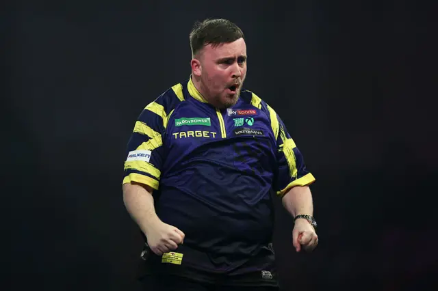 Luke Littler celebrates