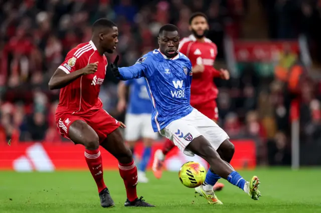 Brian Bobbey and Ibrahima Konate vie for the ball