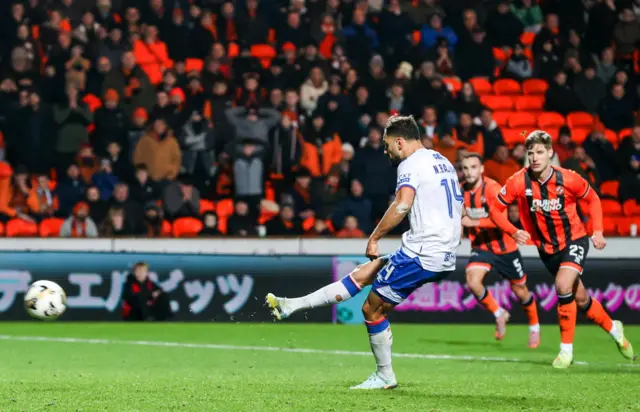 Nedim Bajrami scores from the penalty spot for Rangers