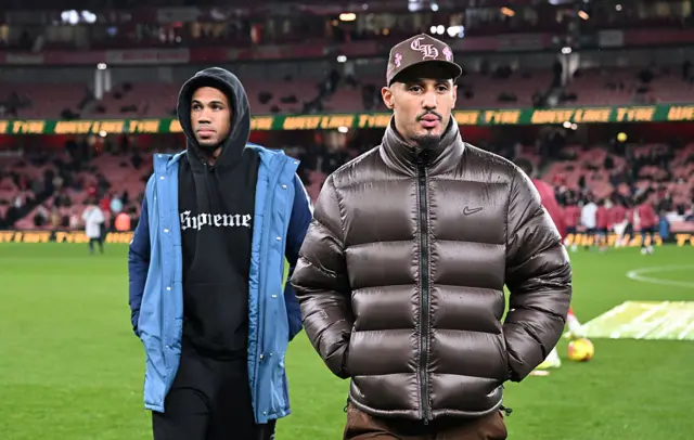 William Saliba (L) and Gabriel (R) of Arsenal are seen prior to the Premier League match between Arsenal and Brentford at Emirates Stadium on December 03, 2025 in London, England.