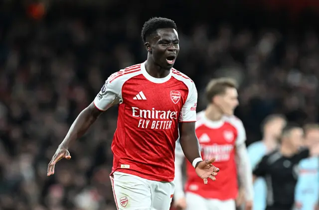 Bukayo Saka celebrates