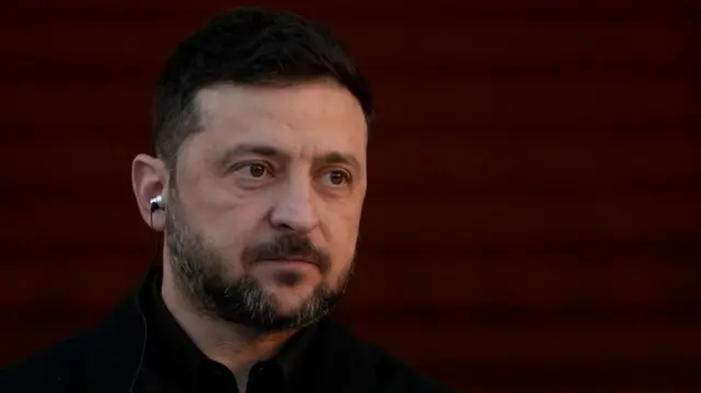 Zelensky in a black jumper
