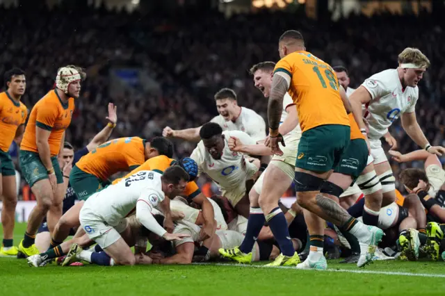 England celebrate scoring a try against Australia at Twickenham