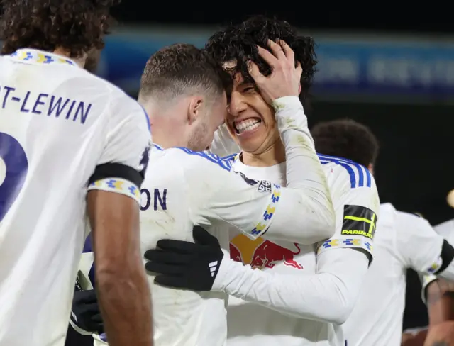 Ao Tanaka celebrates