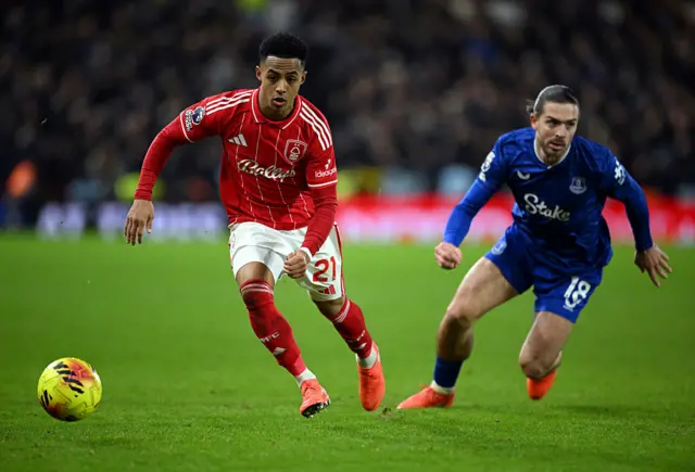 Omari Hutchinson of Nottingham Forest battles for possession with Jack Grealish of Everton