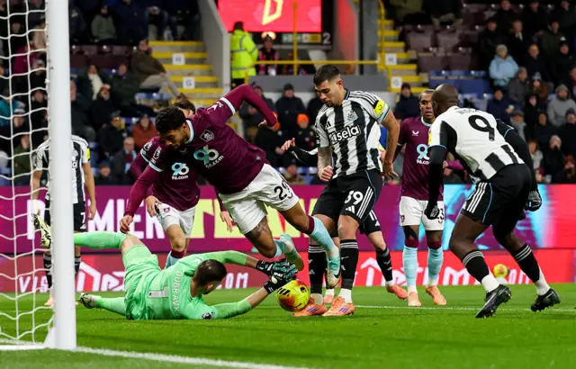 Burnley's Josh Laurent falls to the ground after a challenge