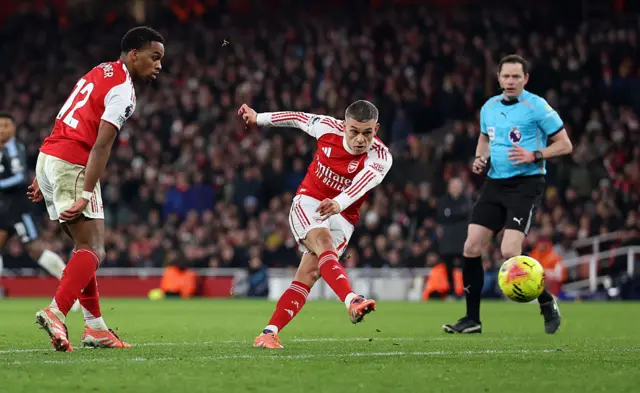 Leandro Trossard of Arsenal scores