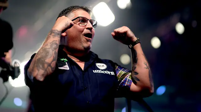 Gary Anderson celebrates