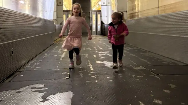 Two of Ben Clark's daughters running in the shuttle