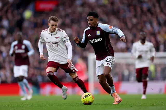 Ian Maatsen and Martin Odegaard in possession