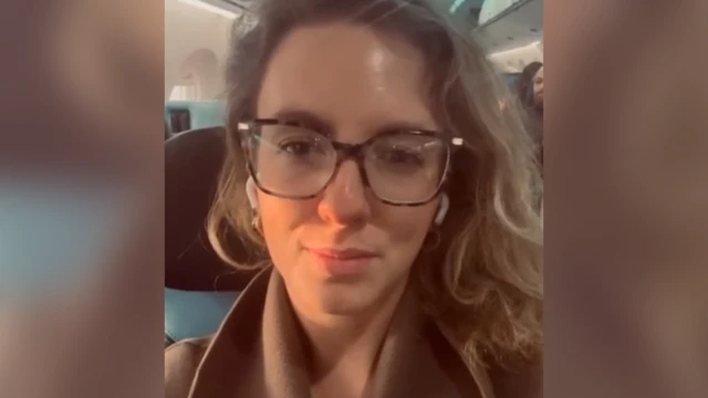 Lauren pictured on her last minute flight out of London after Eurotunnel delays